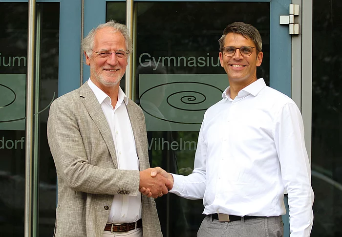 Johannes Baumann übergibt die Leitung des Gymnasium Wilhelmsdorf an seinen Nachfolger Michael Dörmann